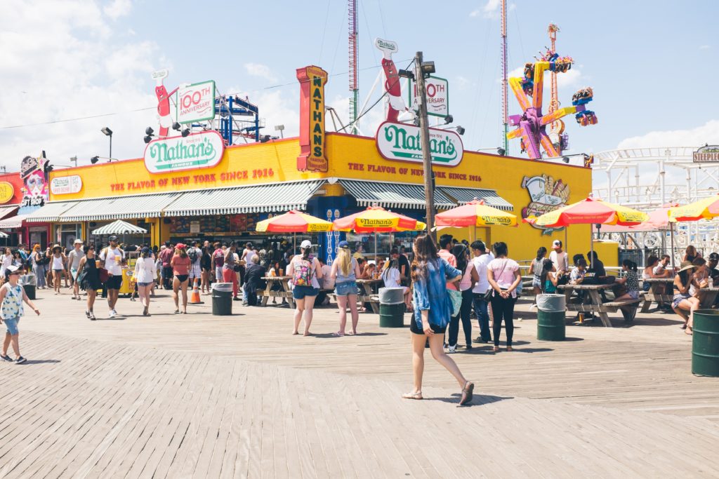 photo of Nathan's famous hot dogs on Coney Island Boardwalk cull of people